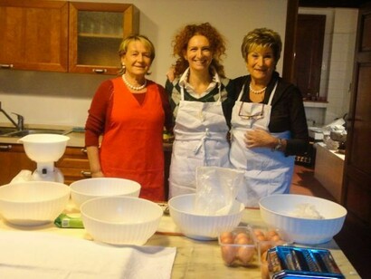 Three coockers looking to the camara