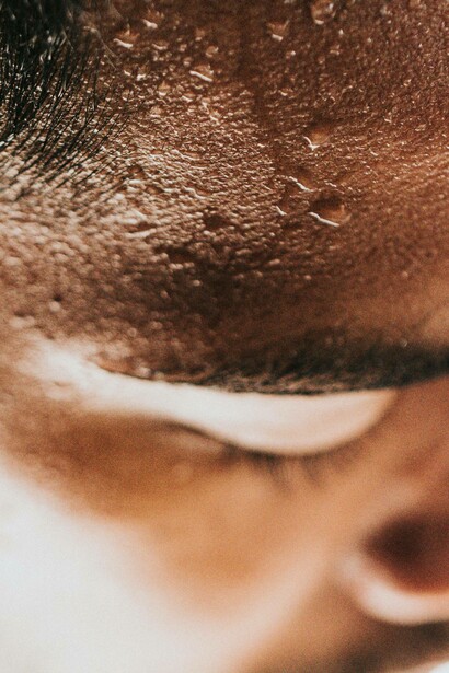 Man sweating from his forehead