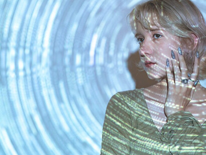 a woman amidst a universe projection texture, complemented by complexity diagrams, inviting contemplation on time perception, human perception, and profound philosophical concepts, enriching your content with depth and resonance