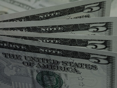 Each crisp bill embodies the financial stability that the U.S. dollar has brought to the Congolese economy, serving as a bridge during turbulent times