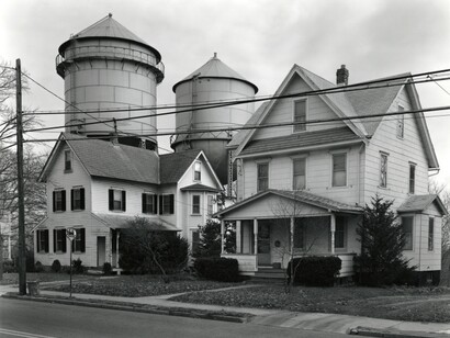 George Tice, Houses and Water Towers, Moorestown, New Jersey, 1973, gelatin silver print, 11 x 14 inches. Courtesy of Joseph Bellows Gallery, La Jolla California