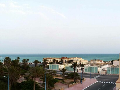 Palm trees and blue water, Dakhla
