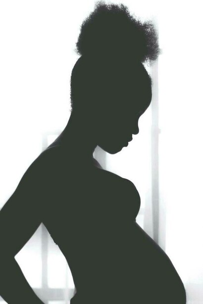 Woman with a baby bump silhouette 