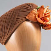 Gertrude's, Brown turban, 1941-45. Courtesy of the New-York Historical Society Gallery. Photo by Anna-Marie Kellen for the Smith College Historic Clothing Collection
