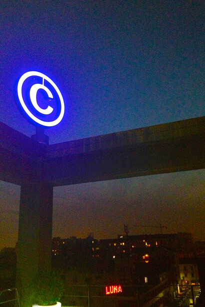 Stefano Cagol , C , 2012. Permanent installation , steel, LED RGB , light controllers , rotation system , 200 x 170 cm . Via Ventura 15 , Milan . Private collection
