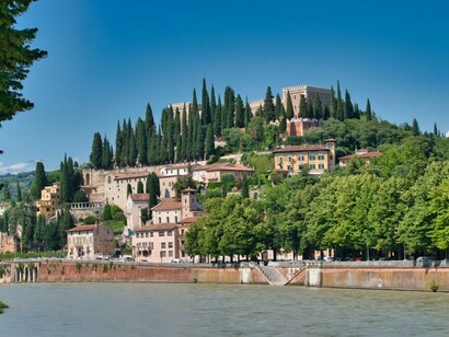 The Adige River flows through Verona, creating a scenic backdrop for the city, Italy