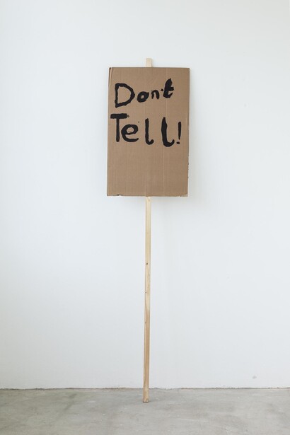 Peter Liversidge, Don’t Tell, Notes on Protesting (2014), Black Emulsion, Cardboard & wood