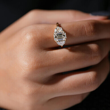 A graceful model wearing a lab-grown diamond ring that sparkles with timeless elegance