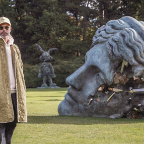 Daniel Arsham with Unearthed Bronze Eroded Melpomene, 2021. Installation view at Yorkshire Sculpture Park. Courtesy Perrotin Gallery and Arsham Studio. Photo by Anthony Devlin. Getty Images for Daniel Arsham