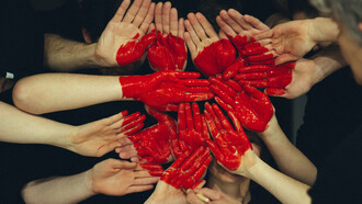 Connected hands representing humankind's unity
