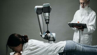 
A doctor using the chatbot on a patient as a means to accelerate healthcare