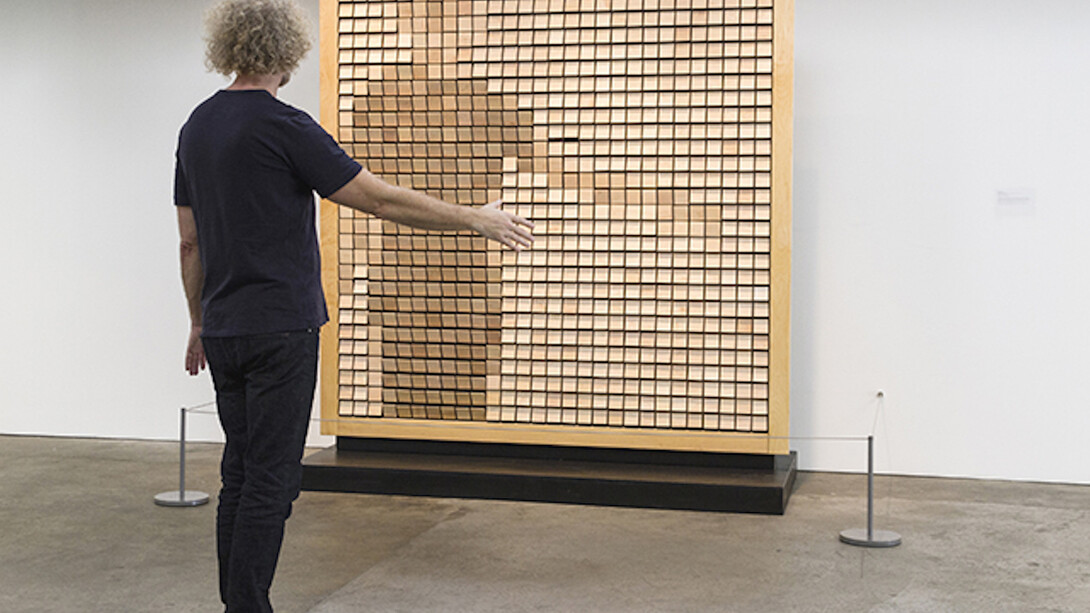 Daniel Rozin, Wooden Mirror, 2014, Wood, motors, video camera, custom software, microcontroller, 6 x 6 ft / 1.8 x 1.8 m. Courtesy bitforms gallery, New York​