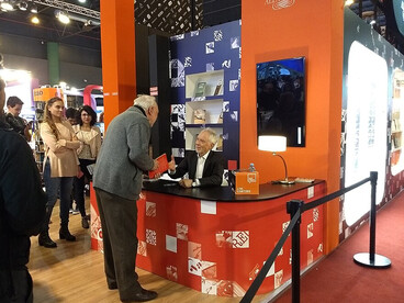 Author J. M. Coetzee signs books at the Penguin Random House Grupo Editorial stand during the Buenos Aires International Book Fair in Argentina
