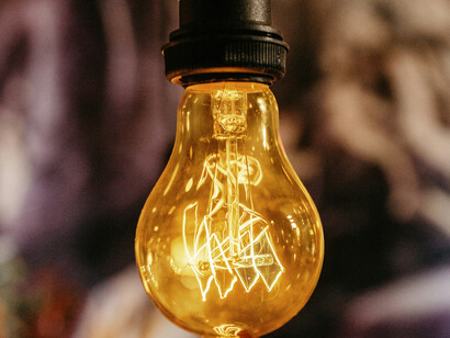 A light bulb symbolizing the true relationship between matter and energy