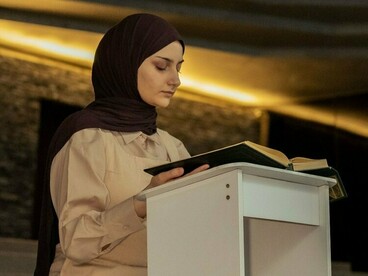 A devoted student studying sacred scripture, reflecting the tradition of faith-centered learning