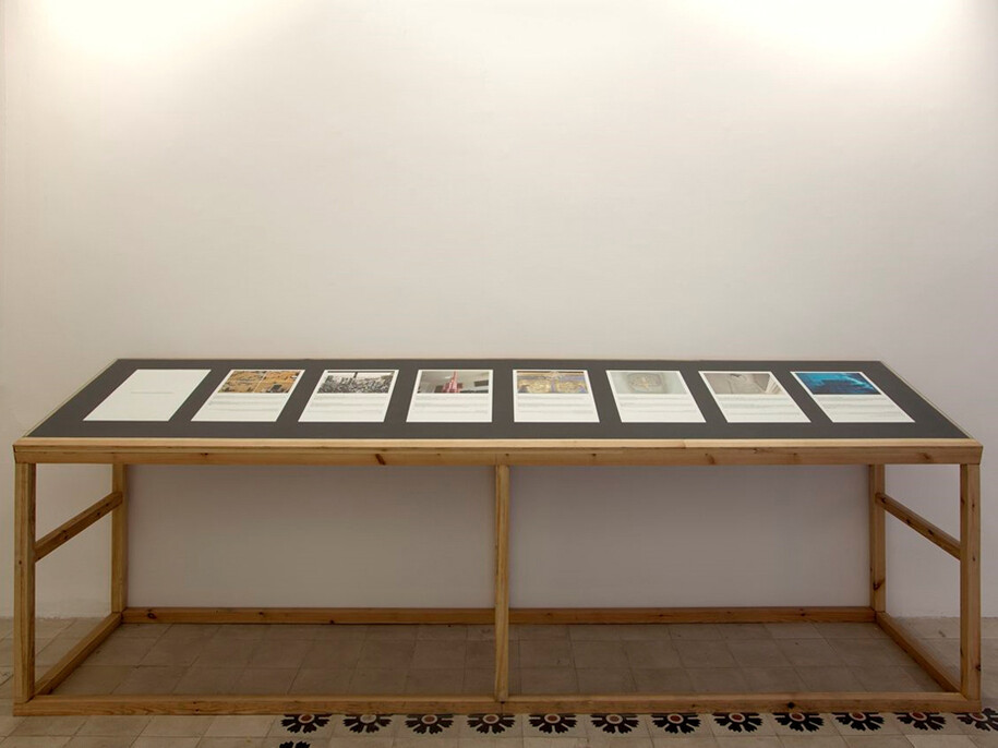 Instructions to Create Your Personal Dubai at Home, 2013, Impressão a jacto de tinta sobre papel de algodão | Inkjet print on cotton paper, 60 x 45 cm (cada/each) / 120 x 400 x 80 cm (mesa/table)