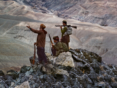 Mujahideen Stand Atop A Mountain in the Hindu Kush, 1984. (Detail) © Steve Mccurry. Image courtesy of Huxley-Parlour Gallery