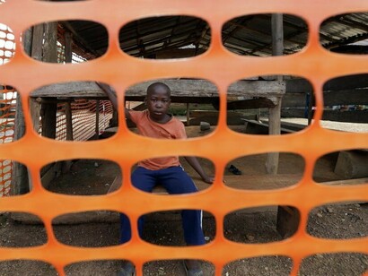 A young boy affected by Ebola