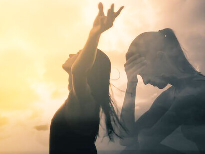 The woman, once burdened by sorrow, transforms into a joyful and self-reliant individual