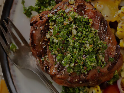 Savor the perfection of an Argentinian steak cooked to medium-rare perfection, complemented by the rich flavors of Chimichurri sauce