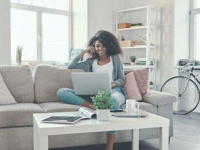 Embracing the freedom of remote work, she uses AI-driven software to manage projects, communicate with colleagues, and stay organised, all from the comfort of her home