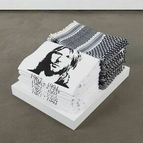 Emily Jacir, Bethlehem street corner  1998, 10 keffiyehs, 10 Cobain t-shirts, 6 1/2 x 17 1/2 x 13 in/16.5 x 44.5 x 33 cm