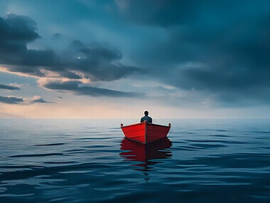 In this serene landscape, a boat gently glides across the calm water, embraced by the soothing ambiance of nature