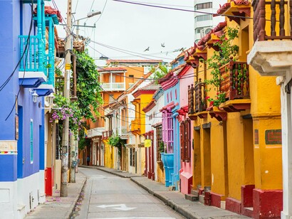 Rows of brightly painted buildings in Cartagena, Colombia, symbolising the city’s vibrant cultural spirit