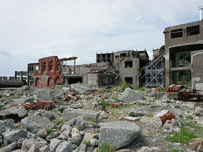 The haunting ruins of Hashima Island, also known as Gunkanjima or "Battleship Island," lie off the coast of Japan, standing as a silent testament to a once-thriving coal mining community