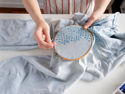 Japanese-inspired sashiko stitching technique for repairing and extending the life of denim garments
