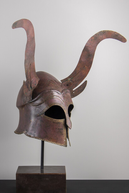 Corinthian Type Helmet with Horns, Greek
Late Archaic, Early Classical Period, ca. 500 – 450 B.C. Bronze
38.6 x 42.5 x 24.7 cm (15.2 x 16.7 x 9.7 in.)
Courtesy of Colnaghi
