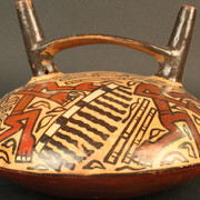 Botella asa puente: ronda de decapitados

Materiales: Cerámica

100 - 700 d.C.

Medidas: 147 mm de alto