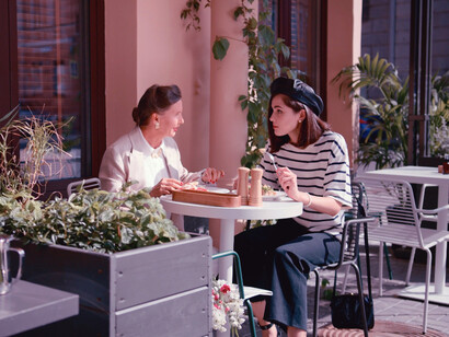 Savouring a beautifully prepared breakfast outside a charming bistro is a testament to the enduring comfort and pleasure that good food and friendship can provide, no matter the state of the world