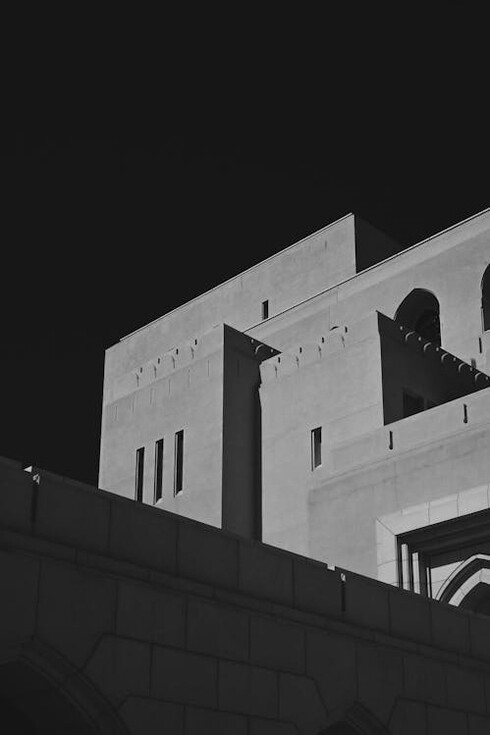 A building stands as a marker of chronological progress, holding the stories of time's evolution