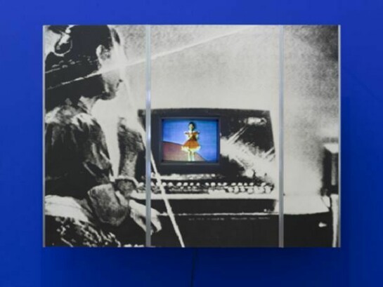 Dara Birnbaum, PM Magazine, 1982, Single-channel video, color, stereo sound; bromide enlargement with speed-rail suspension system, painted wall. 71 x 95 x 20 1/8 in. (180.3 x 241.3 x 51.1 cm). Collection Museum of Contemporary Art Chicago, restricted gift of Joseph and Jory Shapiro, Mr. and Mrs. E. A. Bergman, and Mrs. Robert B. Mayer (1984.7). Photo by Nathan Keay, © Museum of Contemporary Art Chicago.