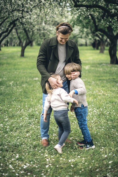 Father showing affection to his children