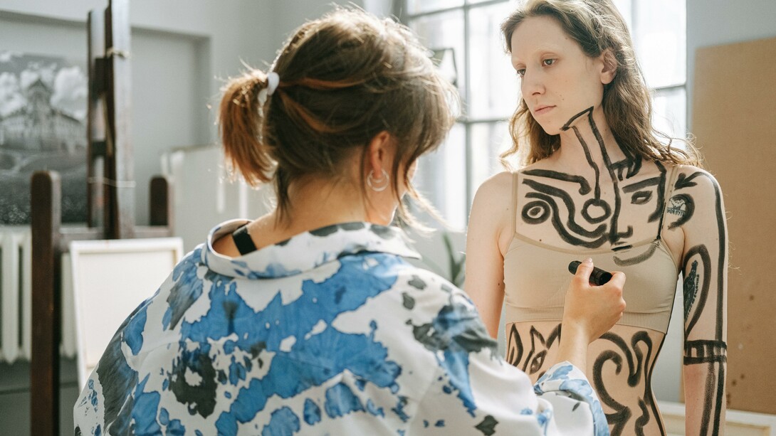 Person having their body painted 