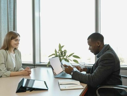 An interview between a male HR representative and a female candidate