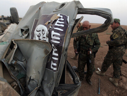 Remains of an ISIS vehicle destroyed by US airstrikes (Ahmad Al-RubayeAFPGetty Images)