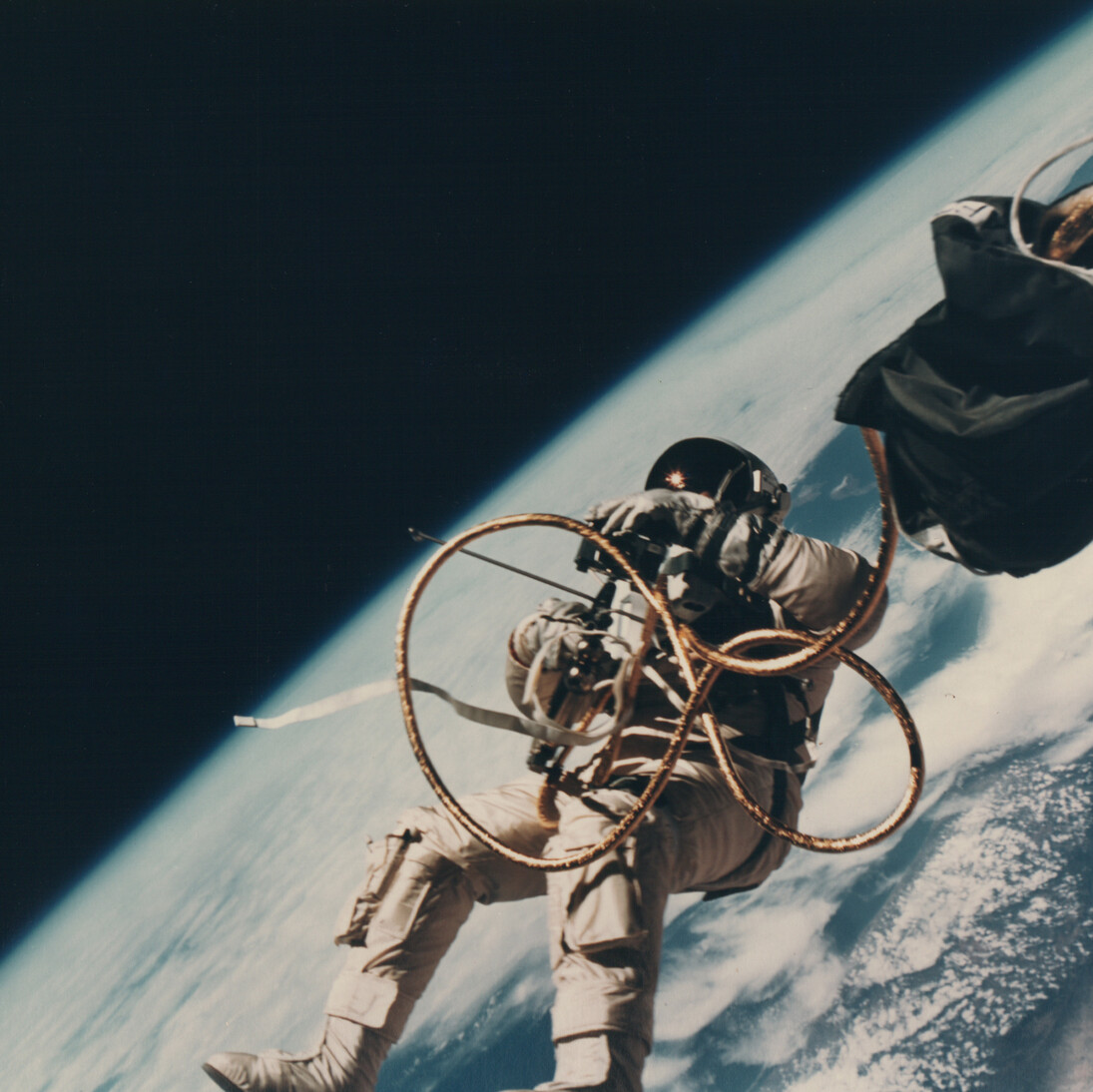 NASA, Gemini 4, James McDivitt, “Ed White Floating in Space”, June 1965, vintage paper, c-print on glossy fibre paper 18,3 (20,3) x 18,9 (25,3) cm, © NASA, Courtesy: Daniel Blau Munich/London