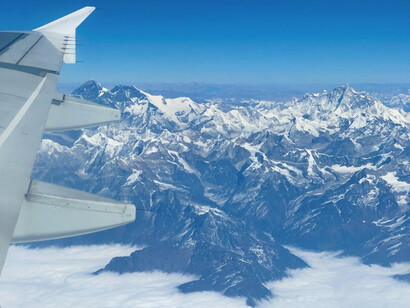 Aerial view of Mount Everest from an airplane window