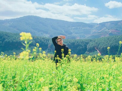 A man surrounded by nature, symbolising the freedom found beyond the constant demands of technology