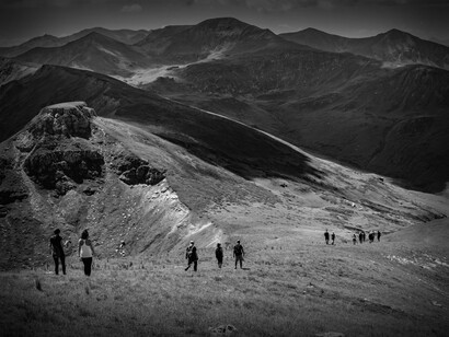 A group of friends hiking together. Social connections and physical activities are high on the list of healthy lifes and longevity in blue zones
