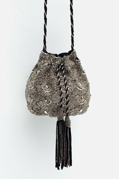 Bolso bombonera con flecos