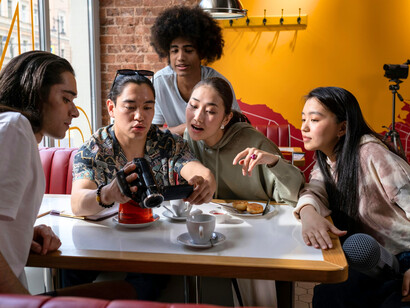 Filmmakers instructing male actors, conveying the industry’s influence over how male identity is framed and perceived