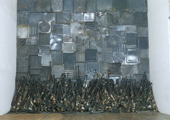 Nari Ward, Iron Heavens, 1995. Oven pans, ironed cotton, and burnt wooden bats, 140 x 148 x 48 inches, Image courtesy the artist and Lehmann Maupin, New York, and Hong Kong