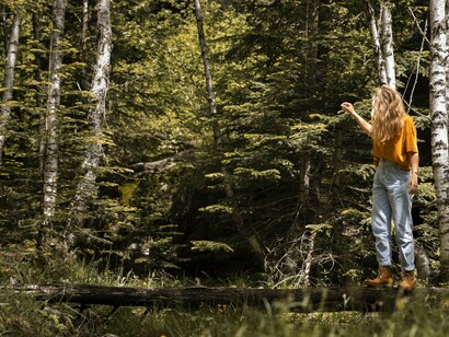 Away from the noise, the ancestral mother whispers again—and she listens