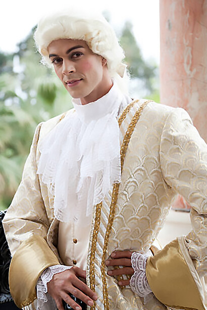 Discover a photograph of an 18th-century gentleman adorned in the lavish and ostentatious fashion of the era, exuding luxury and opulence