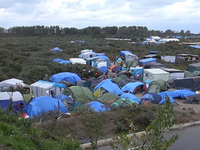 Carpas de migrantes en el campo de refugiados "La Jungla", en las afueras de Calais, Francia, junio de 2015