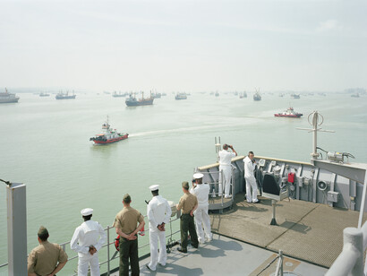 An-My Lê, Manning the Rail, USS Tortuga, Java Sea, 2010, Archival pigment print, 40 x 56 1/2 inches, Edition of 5, Image courtesy of the artist and Murray Guy, New York
